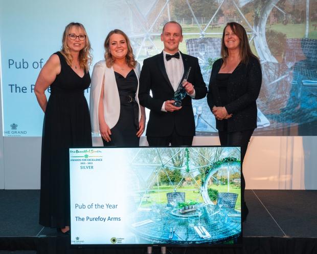 Hampshire Chronicle: The Purefoy collecting their award